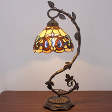You state that this is a Tiffany lamp, is it really an authentic Tiffany and is it stamped Tiffany?